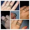 バンドHuitan Fancy Cross Twine Twine Women Ring Gold Color with Micro Crystalジルコンストーンデリケートウェディングリングレディファッションジュエリー