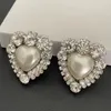 Luxe dames oorbellen sieraden wit goud kleur bling clear cz crystal hart oorbellen clips op voor vrouwen feest bruiloft designer oorbellen oorbellen