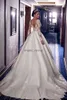 Klasyczne suknie ślubne kaplicy długie rękawowe koronkowe suknie ślubne z koralikami Train Train plus size seksowna bez pleców sukienka panny młodej vestidos de novia