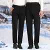 Zimowe pluszowe i gęste spodnie termiczne z solidnymi luźnymi pieszkami