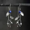 Boucles d'oreilles en pierre bleue ronde en peluche