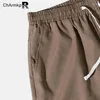 Pantaloni maschili summer charmkpr 2024 uomini pantalone elastico lungo elastico in forma sciolta casual striscia vintage patchwork