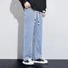 Jeans masculin large jambe pantalon homme baggy ajustement en vrac bleu clair à schéma de traque à schéma fasshion stipes pantalon streetwear