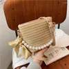 Torby na ramię Pearl Portable Słomka Koreańska Trendy Trendy Baget Bag Simple Bow Messenger Beach Ręcznie tkany torebka