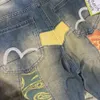 Chaopai Fushen Nya tvättade jeans broderade och tryckta skarvade jacquard mandarin anka raka ben byxor 801120