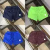 Shorts Designer Coppie da uomo pantaloni Donne Street Swimming for Man Hip Hop Beach High Care Colori a cinque punti Mesh Pantaloni Short Basketball Pant