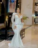 2024 Arabic Aso Ebi White Mermaid Wedding Dresses with Detachable Train gillter Beaded Crystals illusion long sleeve Bridal Gowns