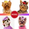 Vêtements pour chiens 20 / 30pcs coiffure arc animal de compagnie de toilettage des arcs colorés de forme en peluche