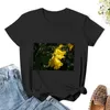 Les jonquilles de polos féminines annonçant le printemps.T-shirt Lady vêtements graphiques T-shirts noirs drôles pour les femmes