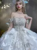 2024 Luksusowe suknie balowe sukienki ślubne księżniczka Suknia Korset Sweetheart Organza Ruffles Cathedral Train Bridal Haft Hafdowe Princess Beach Boho Bride sukienka Bride