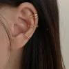 Boucles d'oreilles 3pcs / set Fashion Design simple Design Gold Color Clip Boucles d'oreilles pour femmes Puck Rock Rock Faux cartilage oreille à l'oreille
