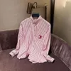 Designer di camicia per arco trionfale Celiene di alta qualità Magliette di moda di lusso camicie di nicchia di nicchia alla moda ricamato camicia a strisce rosa femminile Nuovo stile occidentale