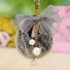 Chave -chave de teclados Originalidade Bowknot Angel Keychain Fur Pompom Ball Ball Holder Saco de Moda Jóias para Presente K1638