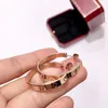 Pendimiento de carro de lujo de alta gama tornillos de lujo de diseño de diseño de moda con superficie lisa de diamante de 18 kc pendientes de anillo grande de metal