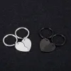 Tags en gros 10pcs / lot Blank Puzzle Heart Keychains Keychains en acier inoxydable ID Pet ID pour le bricolage de logo personnalisé Nom de couple accessoires