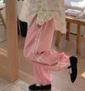 Kusahiki côté mode pantalon de survêtement à rayures à rayures de bowknot causal pantalon de taille haute taille élastique 240410