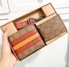 Mens Luxurys Designer Wallet Cardholder Lederen kaarthouder Coache munt Portemonnees Stripe reliëfvoeten Dames pocket portemonnee mode paspoorthouders vouwen sleutel zakje