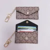 985 Luxury Designer KeyChain Fashion Womens Mini Plånbok Högkvalitativ äkta läder Mänmynt Purse Color Wallet Holder Holder Holder