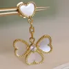 Top Quality Classic Style New Fanjia Clover Earrings Double Flower Mother Shell High Electroplated Thick Gold Versatile Simple