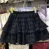 Saias Mini saia beleza fofa e sexy Cantura alta vestido de bola elástica branca usando lolita listrada solta l347