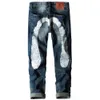 Fushen dżinsy z prostą, dużą marką drukowaną M White, modne i modne męskie dżinsowe spodnie 348240