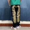 Fu shen trendy personalisierte Männer vielseitige Mikro -Lein -Jeans mit großen M -gedruckten Graffiti -gestickten langen Hosen in Originalfarbe 357175