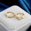 Wedding Rings Trendy Golden Color 2pc Bridal Ring Sets vrouwelijke huwelijksceremonie accessoires met heldere zirkonia mode luxe sieraden
