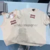 女性用Tシャツデザイナーティーショートスリーブミウイ早春にスタッドレター2024春/夏新しいTシャツトップTT67272F