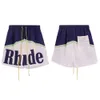 Trendy Rhude Letter Color Blocking Casual Sports Elastic Shorts for Men and Women's American High Street Beach Pants