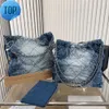 Sac de créateur Denim Sac à vaisselle fourre-tout Backpack Travel Designer Femme Body Sac à main le plus cher avec chaîne argentée Gabrielle