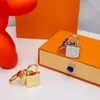Top Luxury Designer Lock Keychain Dernier style Gradient Couleur Keychains Sac coloré Pendante Car Key Chain Letter ACCESSOIRES ACCESSOIRES DE BOX CADEAU BOX