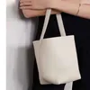 O balde R 100% de couro genuíno sacos de maçaneta feminina bolsas de ombro feminino Tootes de pele de peles Designer Bolsas vintage Bolsas de mamãe da axil.