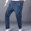 Herr jeans last jeans män elastiska plus storlek 48 46 44 42 hög midja byxor raka arbete byxor avslappnad sträckt svart denim streetwear 240423