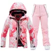 Giacche 2023 Nuova vestito da sci mimetico rosa Donne inverno piste snowboard impermeabile pantaloni da neve abiti da cammino da neve