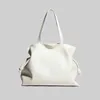 Niche 2024 Design Large Capacity Single Shoulder Bag with Solid Color Drawstring Cuffs Underarm Cowhide Lucky Womens