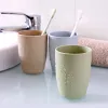 Zahnbürste Feste Farbe Zahnpasta Tasse Pinselregal Zahnbürste Halter Wasser Becher Kunststoff Kreatives Cartoon -Badezimmerzubehör Accessoires