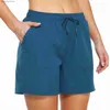 Kvinnors shorts kvinnor sommar snabb torkande gym fitness shorts kvinnor dra stång vandring multi ficka kör hopp rep H240424