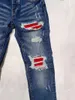 Jeans pour hommes pantalon long pour l'homme pantalon de denim masculin trou trou de peinture de peinture