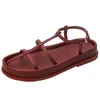Piattaforma di scarpe casual sandali romani per donne piatti con fibbia cavi 2024 Summer Open Toe Beach