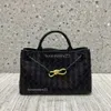 Lady East/West Tote Bag Classic Bagsデザインアンドアモ新しいメタルバックルレザー織りトートシングルショルダー大容量女性用