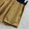 Shorts pour femmes 24 Spring and Summer Limited Ribbon épissant Big Pocket Pocket Denim Version du haut du corps Super Thin.20