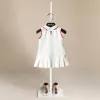 Ensembles 2023 Nouveau été 112 ans Child Preppy Style White Coton Colon Patchwork Bow Pasted Robe For Kids Baby Girls Brand Design