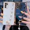 الغطاء الخلفي مع Clover Camellia Golden Chain Girly Bling Holding Soft Fase for iPhone 15 13 14 12 Pro Max 11 XS X XR Case Mini SE