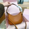 2023 Zhang Yuanying Same Style Cowhide Underarm Handheld Crescent Simple and Advanced Single Shoulder Half Moon Bag