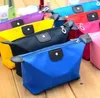 Hot sale dumpling type cosmetic bag storage bag folding waterproof makeup toiletry bag