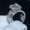 Bandringen super stralende vrouwen mannen mode ring prachtige zilveren kleur ingelegde zirkon stenen bruiloft voor verloving sieraden H240424