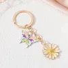 Keychains jolies fleurs plantes de papillon coloré volant des insectes anneaux clés pour les femmes Girls Amitié cadeau bijoux faits à la main