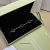 High End smycken armband för VanCleff Womens fyra bladgräs Fem blomma armband kvinnlig full diamant naturlig sten röd jade pläterad med 18k guldlager original 1: 1