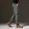 Erkek pantolon 2024 bahar ince düz taklit denim elastik pamuk iş rahat moda siyah gri yeşil marka pantolon