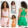 Tenue de yoga al-0003 Femmes de sport de sport extérieur Bra élastique Tauge de mode Pliped Jupe Femmes de vêtements de sport Active Drop Livraison à l'extérieur Fitn Otbnu